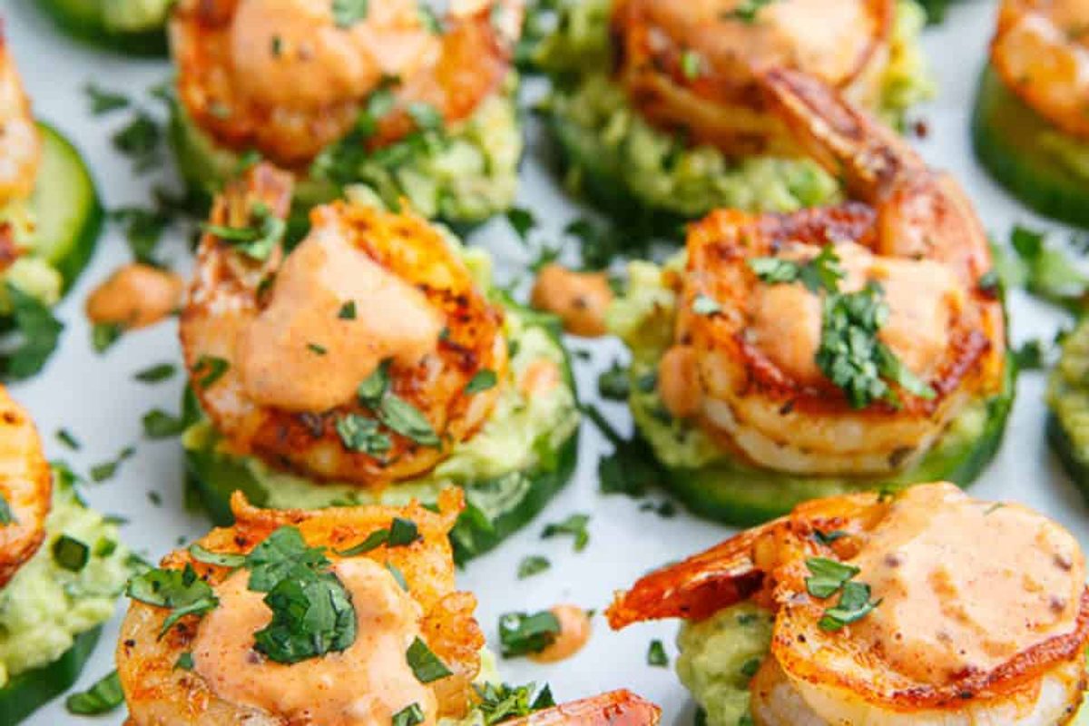 Chilled shrimp and guacamole bites on cucumber rounds